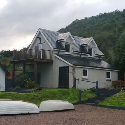 Contemporary Lochside self catering in the Scottish Highlands. Stunning sea and mountain views.