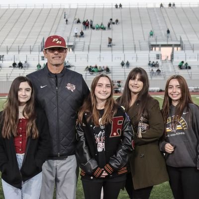 Head Baseball Coach Leander Rouse. Proud dad and husband.