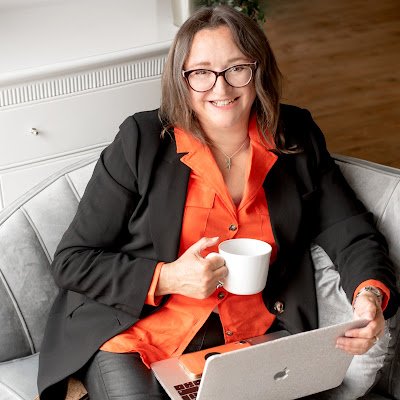 Shih Tzu wrangling Chartered Psychologist and Director of Human Science at Immersive Labs