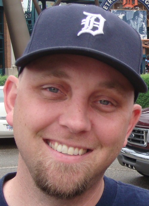 Hubby, dad, and son...as well as Bulldog hoop coach and Bulldog security and wedding officiant…