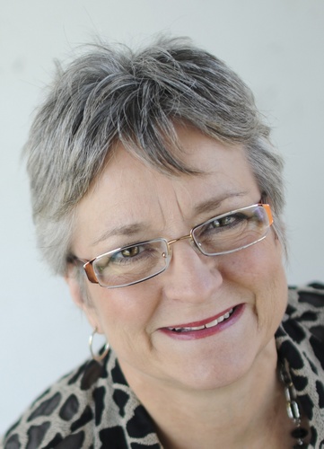 a Certified Business Coach who loves helping people develop more of their potential