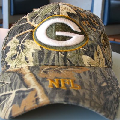 a geniune Wisconsinite... green n gold forever... God Bless the USA... is it spring yet?... green thumb gardens... country boy planted in town...