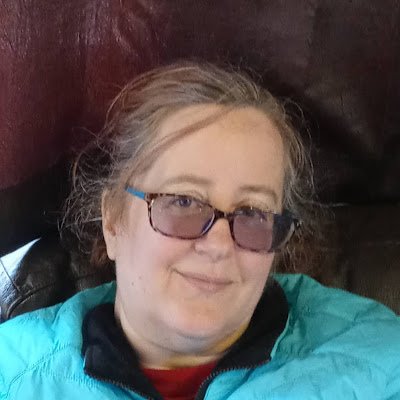 I dress funny because I don't care what people think long as I'm comfortable. My talents are amateur harp, guitar and semi-skilled cook. I'm an artist.