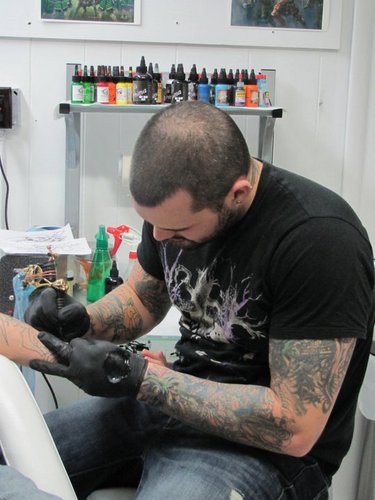 I am artist and owner of special effects tattoo and body piercing I will be posting specials and deals on a regular basis