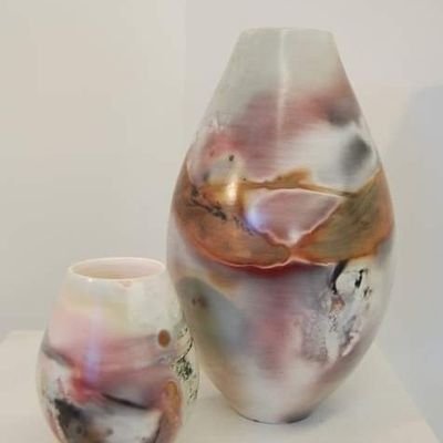 Ceramic Artist of Betws-y-Coed Snowdonia,  now based in Manchester. methods  of firing Raku and Pitfired pottery , Wheelthrown functional stoneware