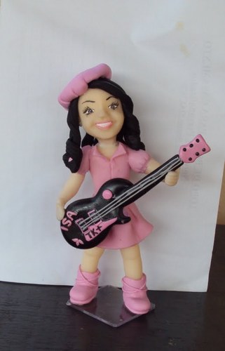 Trabalho com biscuit, amo o q faço.......
