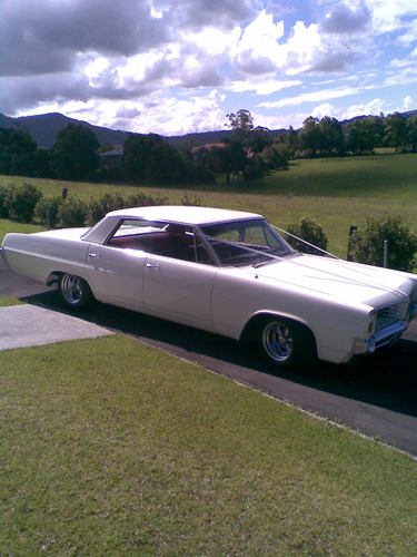 N_C_WeddingCars's profile picture. Northern Classic Wedding Car Hire is based in Wollongong NSW, and offers matching 1964 Pontiac Pillarless Parisenne's.