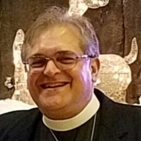 A thoughtful and caring Episcopal Priest, a loving husband and father of two beautiful daughters and seven grandchildren (3 young men, 4 young women).