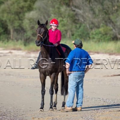 Racehorse Trainer doing  heavy sand training and beach work.