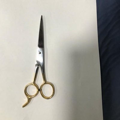 Scissors are essential tools at any barber or hairdresser's shop. Barbers keep multiple scissors with different blades and sizes