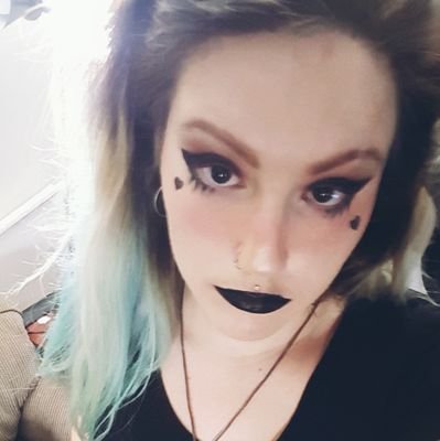 MissWolfie88's profile picture. she/her