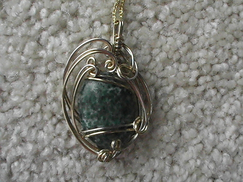 Iam a wire sculpter
I sculpt around pretty stones with Sterling silver and 14kt Rolled gold.
THANKS
Mary