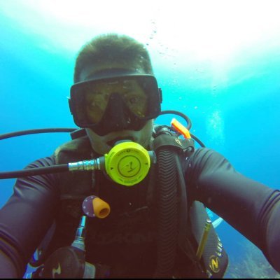 Divemaster at French Angel Expedition Caye Caulker