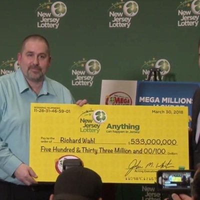 47 year old production manager winner of the largest power all jackpot lottery . $553 million giving back to the society with the help on any credit card debts