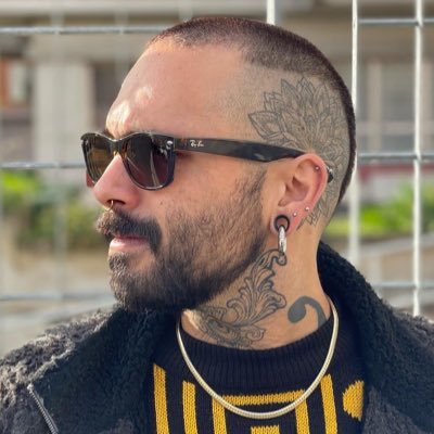 Tattoo and portrait artist living in is own inked world