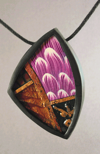 Fine art jewelry and turned wooden objects by Margaret and Tom Donnelly. nobody,not even the rain,has such small hands