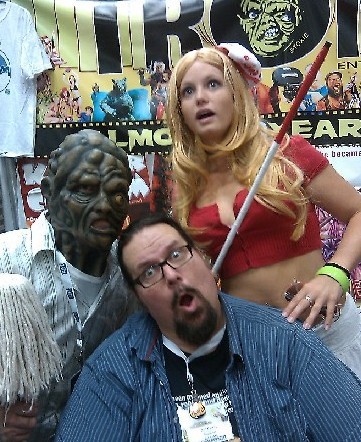 Troma Entertainment Convention Manager and Trophy Wife - aka The fat guy from that movie.