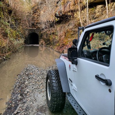 Off-road driver, off-road chef, two jeeps, making the most out of this life! Cast Iron and jeep dogs!