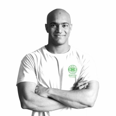 An experienced fitness professional, strength and conditioning coach, and a competitive powerlifter.