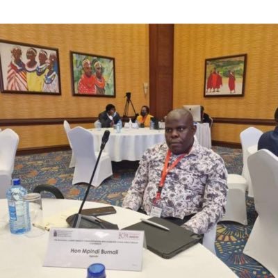 A member of parliament of the Republic of Uganda, President Uganda paralympic committee and member of the Africa Paralympic committee governing board.