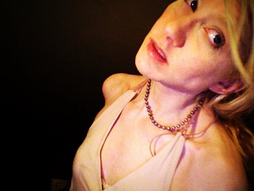 Eager but Eccentric escort...High-class Harlot...Sensual Servant to the Id...Part-time Pro...and, sadly, Call Girl who can't shake fear of the phone.