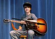 A happy boy who will be getting a great singer