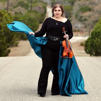 The violin-wielding master of leveraging psychology to elevate business results in marketing for small business owners!