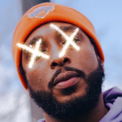 A photographer/videographer. “Sprayed 80 da baby woke up”