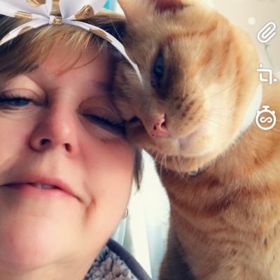 welsh, female, and loves all animals especially cats! and rugby and all types of music.