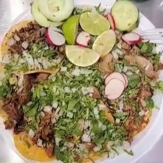 Washing down a taco with liberal tears.