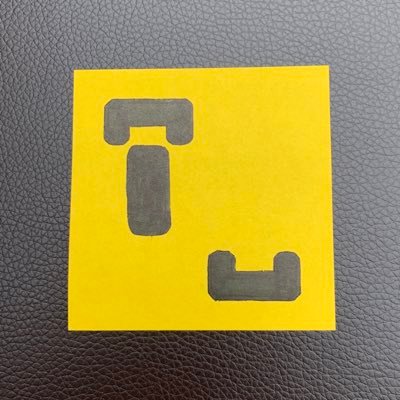 It's yellow. It's small. It's square. It's a Playdate game review on a Post-It.