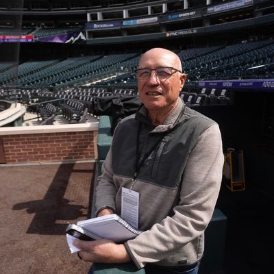 Scribe, grape farmer. The photo was taken by Dave Zalubowski at a May 2022 Rockies game at Coors Field we were getting ready to cover.