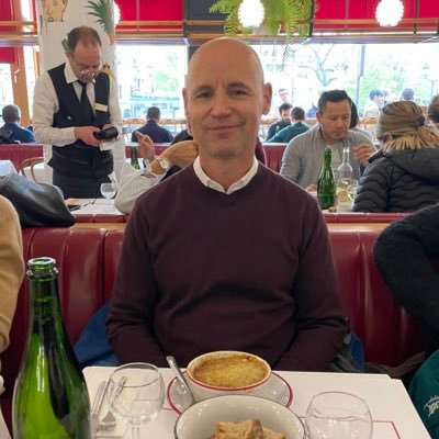 ChristoMackin's profile picture. People whispering globe trotter