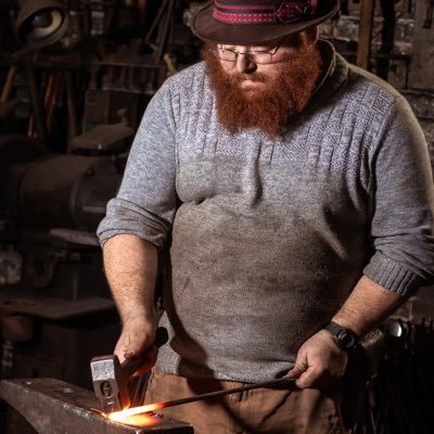 a Jewish blacksmith working and living his life