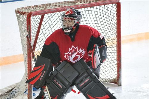 Goalie for Ringette, Roller Hockey and Ice Hockey. Go Canada Go!