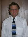 I hold multiple associates degrees from Gogebic Community College, a BA from Michigan Tech, a BA and MBA from the University of Phoenix, and am a Black Belt