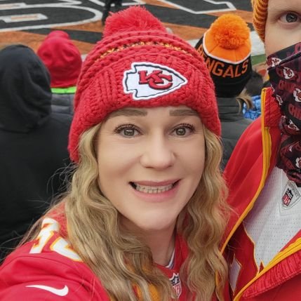 Math teacher, mother of two boys, sports fan (Go Chiefs, Go Irish), and runner