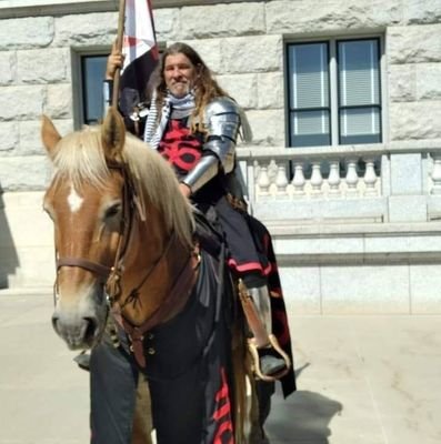 Former Magister Equitum-The Satanic Temple's Mounted Color Guard, Former Minister Satanae, Horseman, Jouster, Musician, Historian, and Fall- Down Tragedian