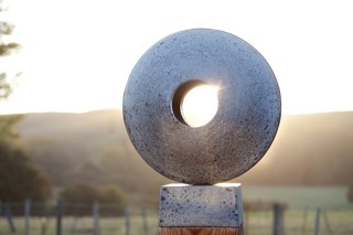 Michael MacMillan is known for his large outdoor Sculptures most commonly crafted from Polished Aggregate. His work is bold, reflective, textured,carved,kinetic