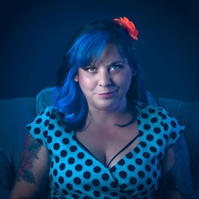 4 piece rocking band led by singer-songwriting, mom, teacher, LGBTQ advocate: Lori Girard (she/her).