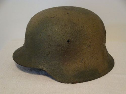 MILITARIA WANTED! We pay top dollar for the following items: German Helmets and Headgear, Uniforms, Insignia, Fieldgear, Medals and Orders.