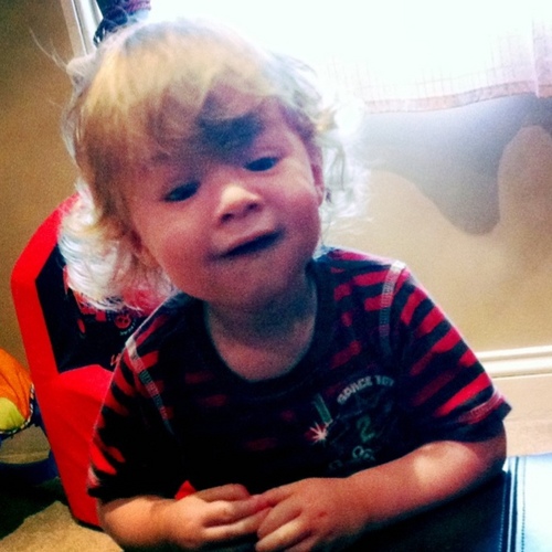 I'm 2 feet, with curly blonde hair and super cute blue eyes!