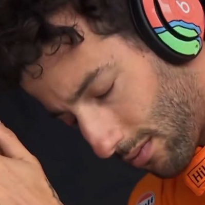 Ricciardo (emotionally) listening to different songs.