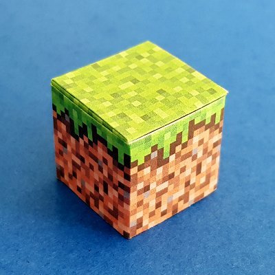 I design Minecraft origami blocks with printable templates that you can use to make cool Minecraft builds with paper. Pixels, papercraft and papertoys!