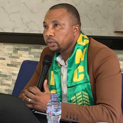 CT à l'unikin,Avocat à la Cour, Dircaba  du min de l’urbanisme et habitat, Président National a.i du CNC et membre de l'AACPG, Chrétien Adventiste du 7e jour.