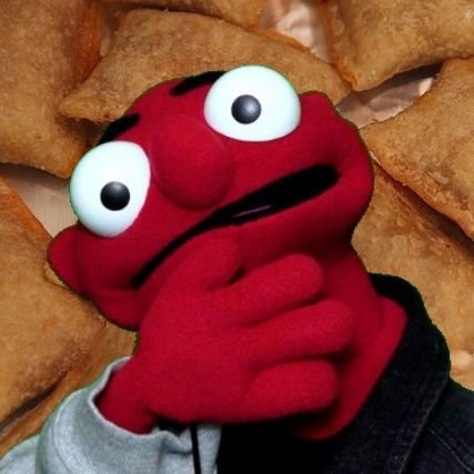 Puppet. Pizza roll enthusiast. Unreliable narrator. The real star of One Wall Comedy.