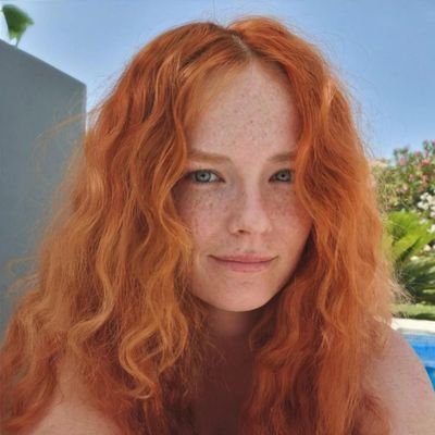 Hot redhead with huge boobs