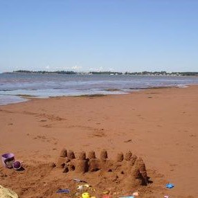 Nestled down a 2km red dirt road lined with lupins in early summer, sunsets, and red cliffs that are worthy of the best pictures in Chelton,PEI.