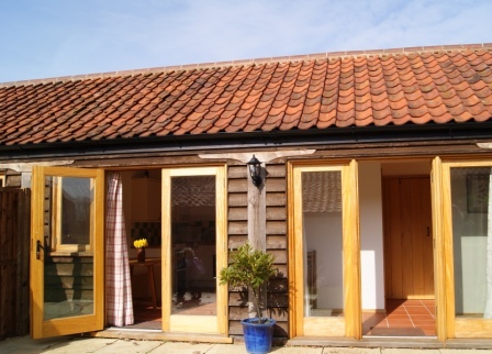 Two lovely, eco-friendly barn conversions and a Shepherd's hut  on a picturesque farm near Aylsham.