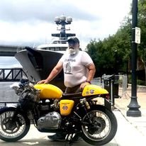 Beard Motorcycle 
Dumbest smart guy you will ever meet